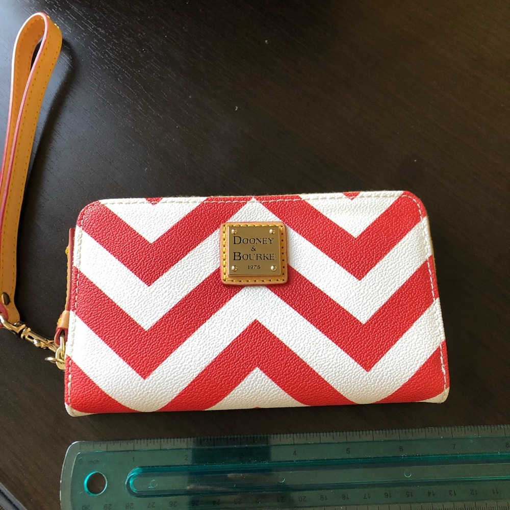 Authentic Dooney & Bourke chevron print wristlet.